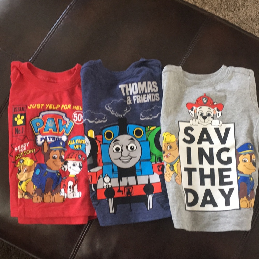 Two Paw Patrol and one Thomas Train T-shirt.
